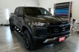 Front view of a green Chevy Colorado after ceramic coating