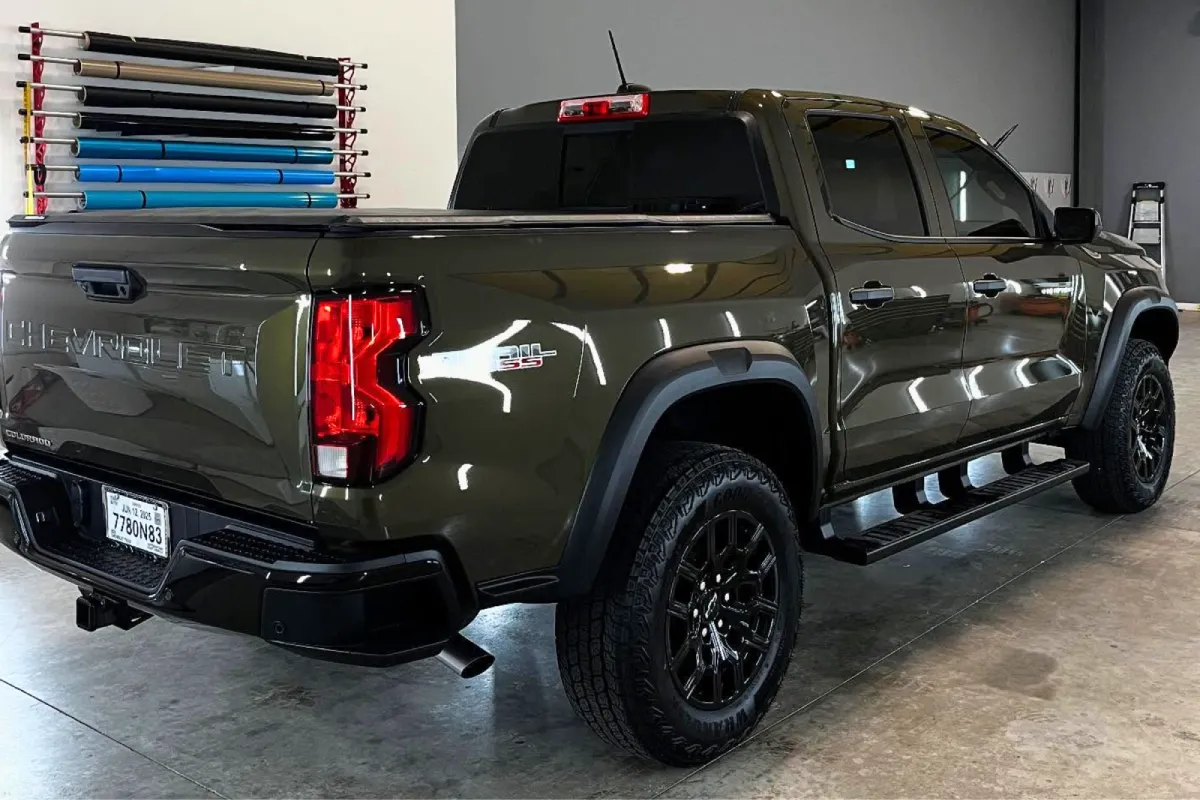 Green Chevy Colorado truck with glossy ceramic coating