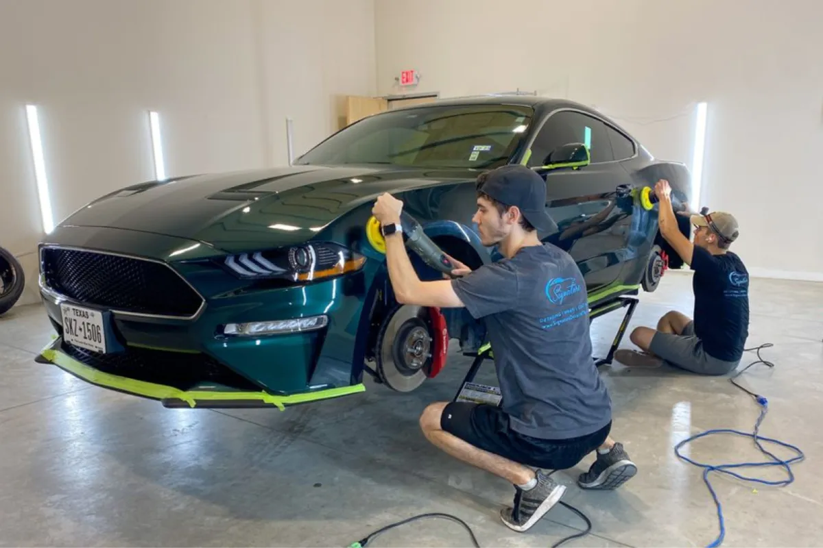 Ceramic coating application on a Ford Mustang for enhanced paint protection.