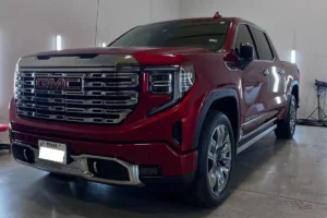 Paint-corrected GMC Sierra with a flawless, glossy finish.